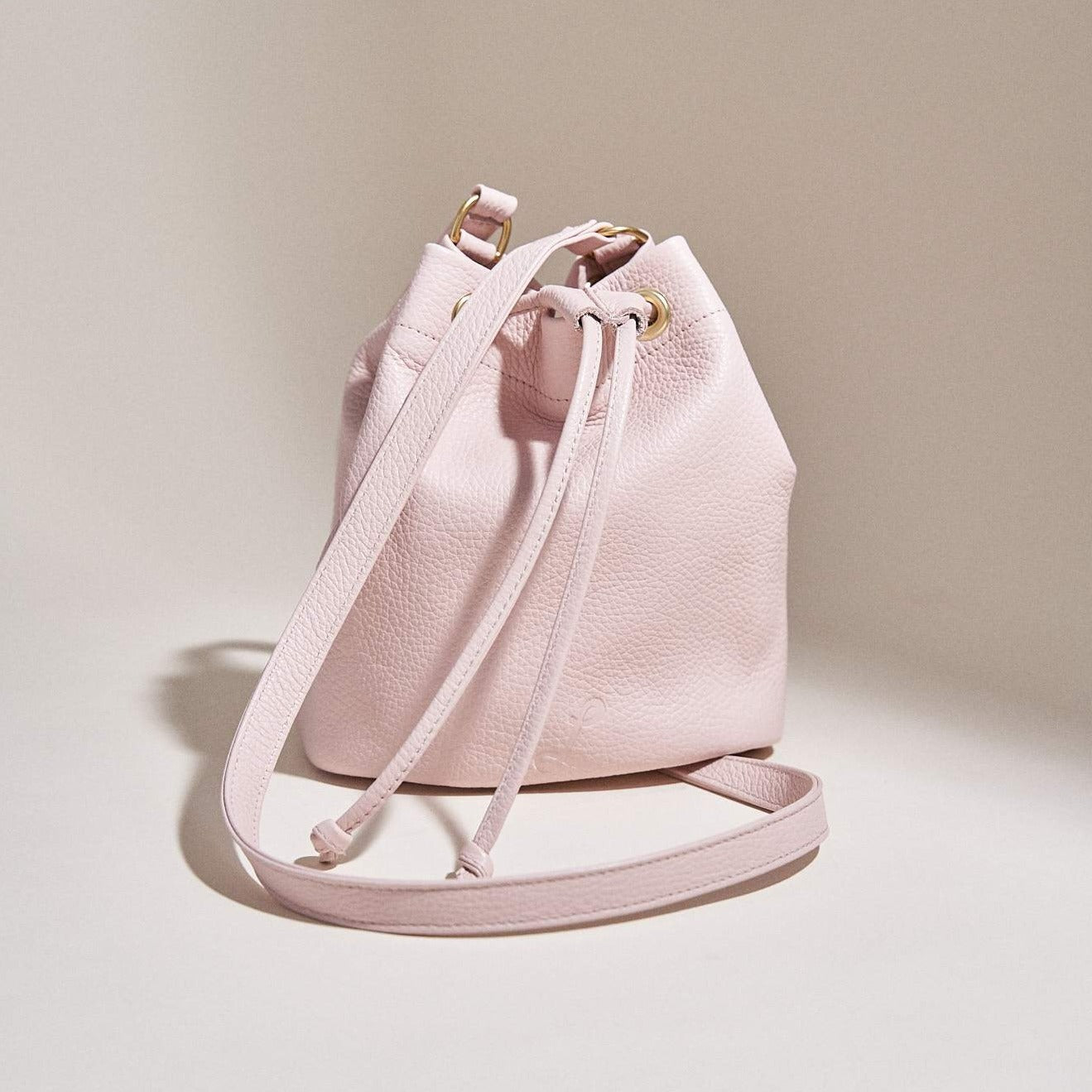 Pale Pink Leather Mini Drawstring Crossbody Bag