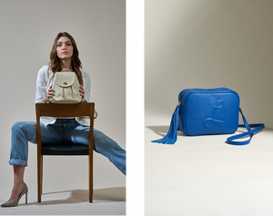  Model Sitting with a Cream Leather Bag and a Cobalto Blue Crossbody Bag made by LUND Leather 