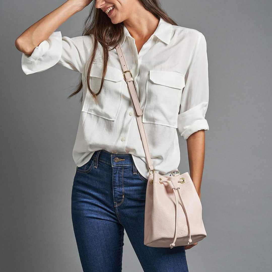   Women’s light pink drawstring bag DH3771 MTR Pale Pink Leather Mini Drawstring Crossbody Bag | Lund Leather