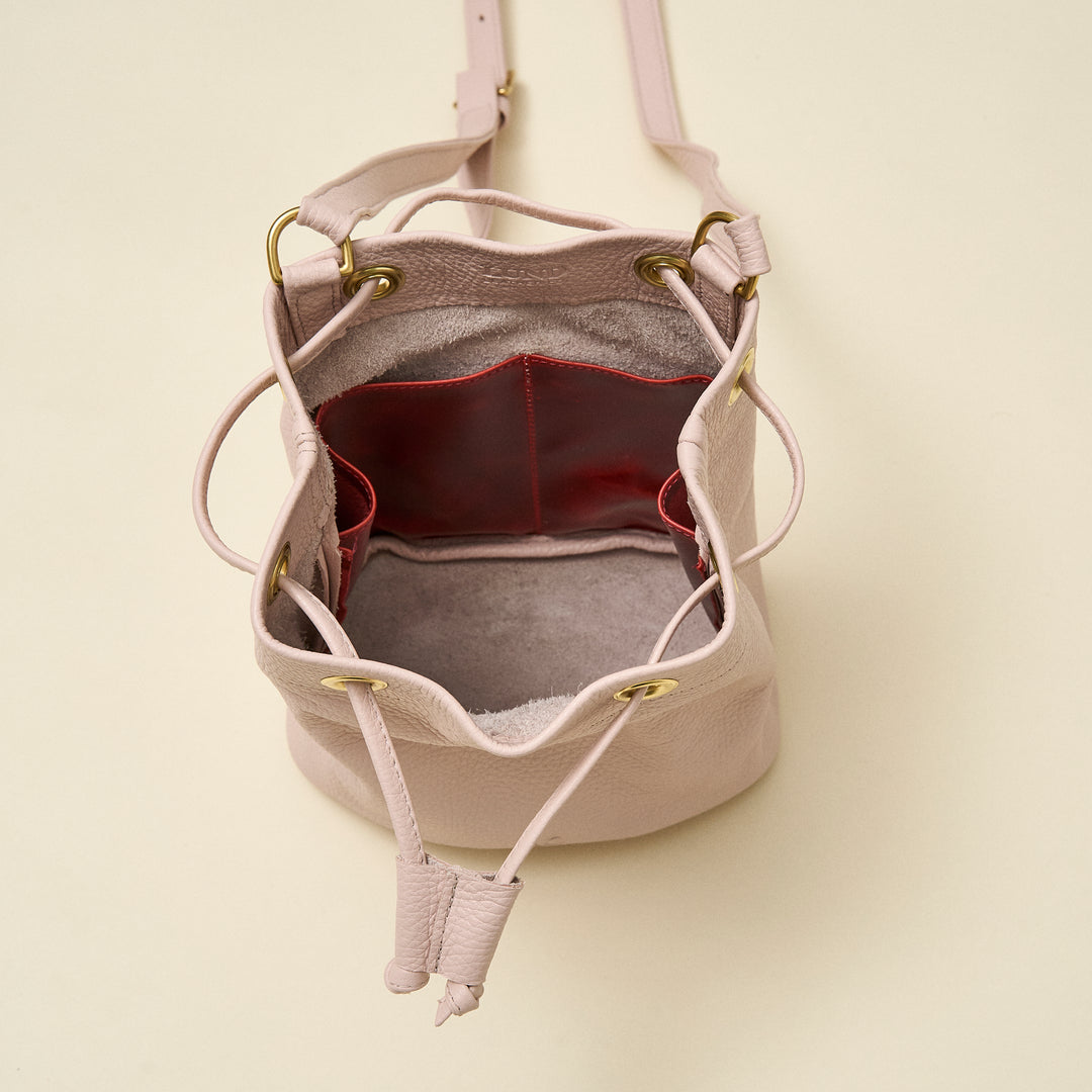 Pale Pink Leather Mini Drawstring Crossbody Bag